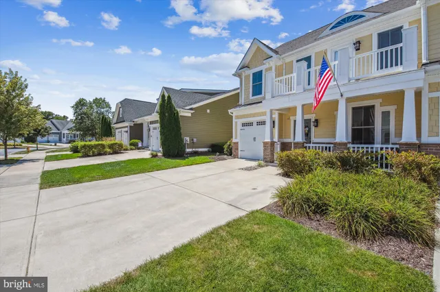 a patio with a yard table and chairs