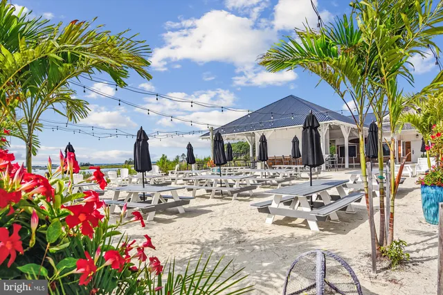 a view of multiple houses with outdoor space