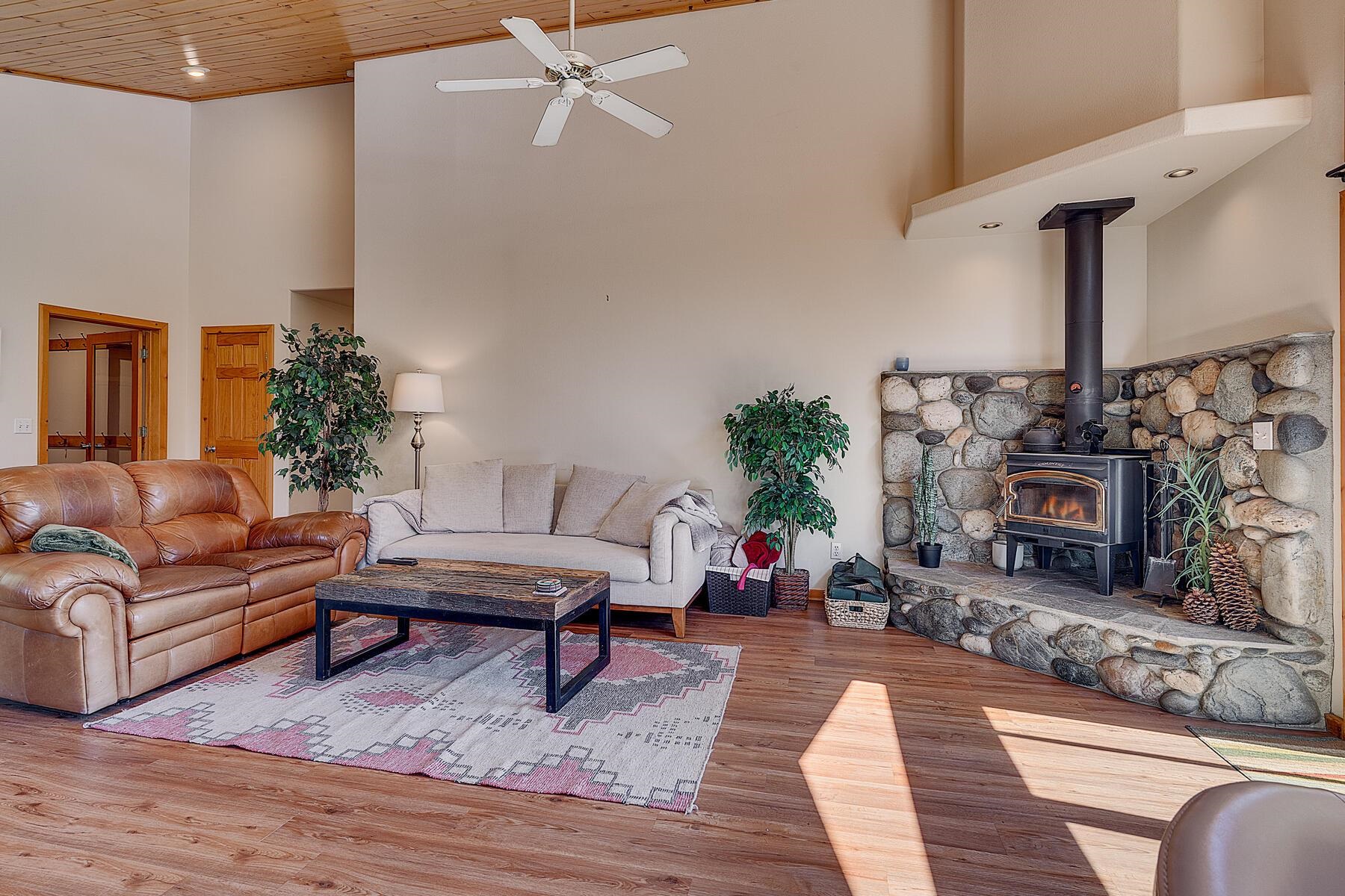 11511 Baden Road Truckee, CA 96161 - Photo 12 of 28 a living room with furniture and a fireplace