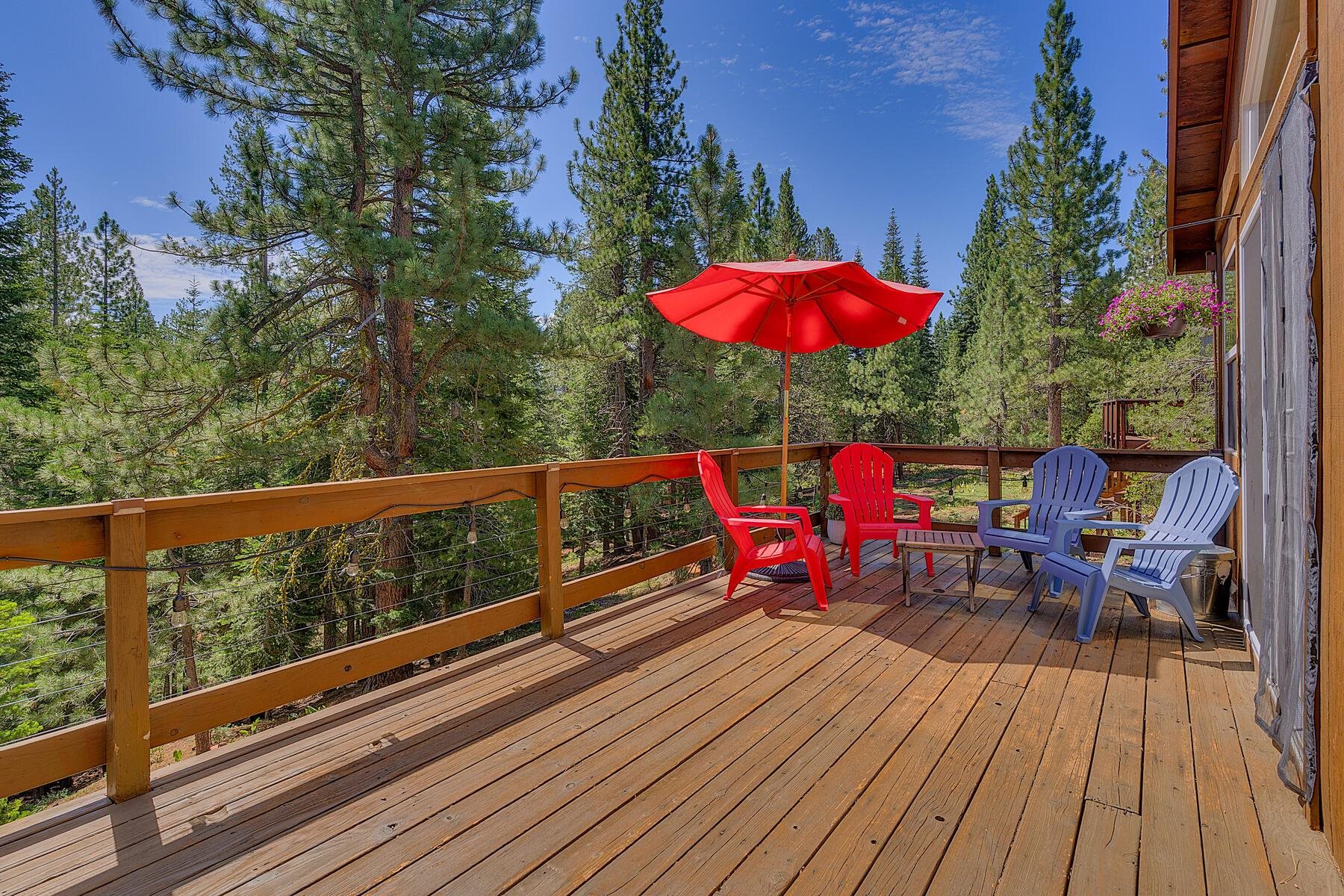 11511 Baden Road Truckee, CA 96161 - Photo 15 of 28 a view of a balcony with wooden floor and outdoor seating
