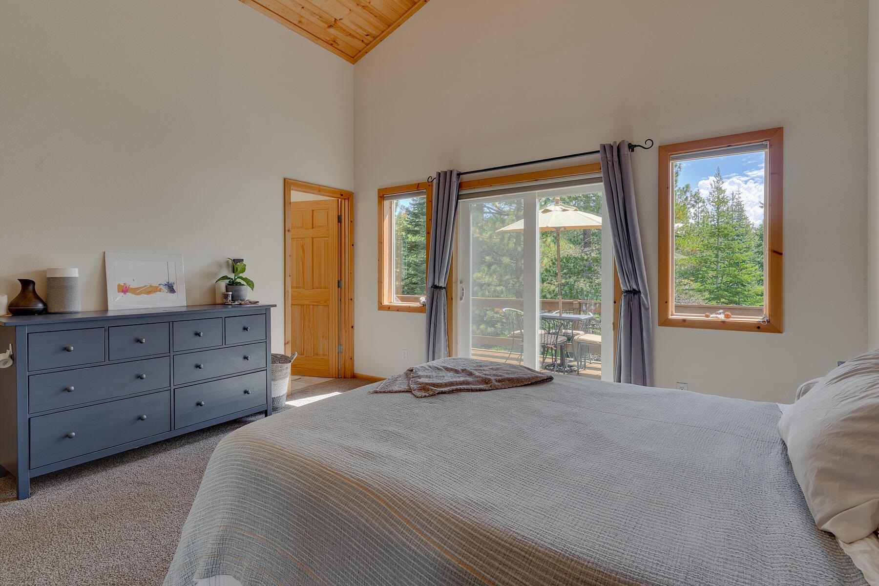 11511 Baden Road Truckee, CA 96161 - Photo 18 of 28 a bedroom with a bed and a window dresser