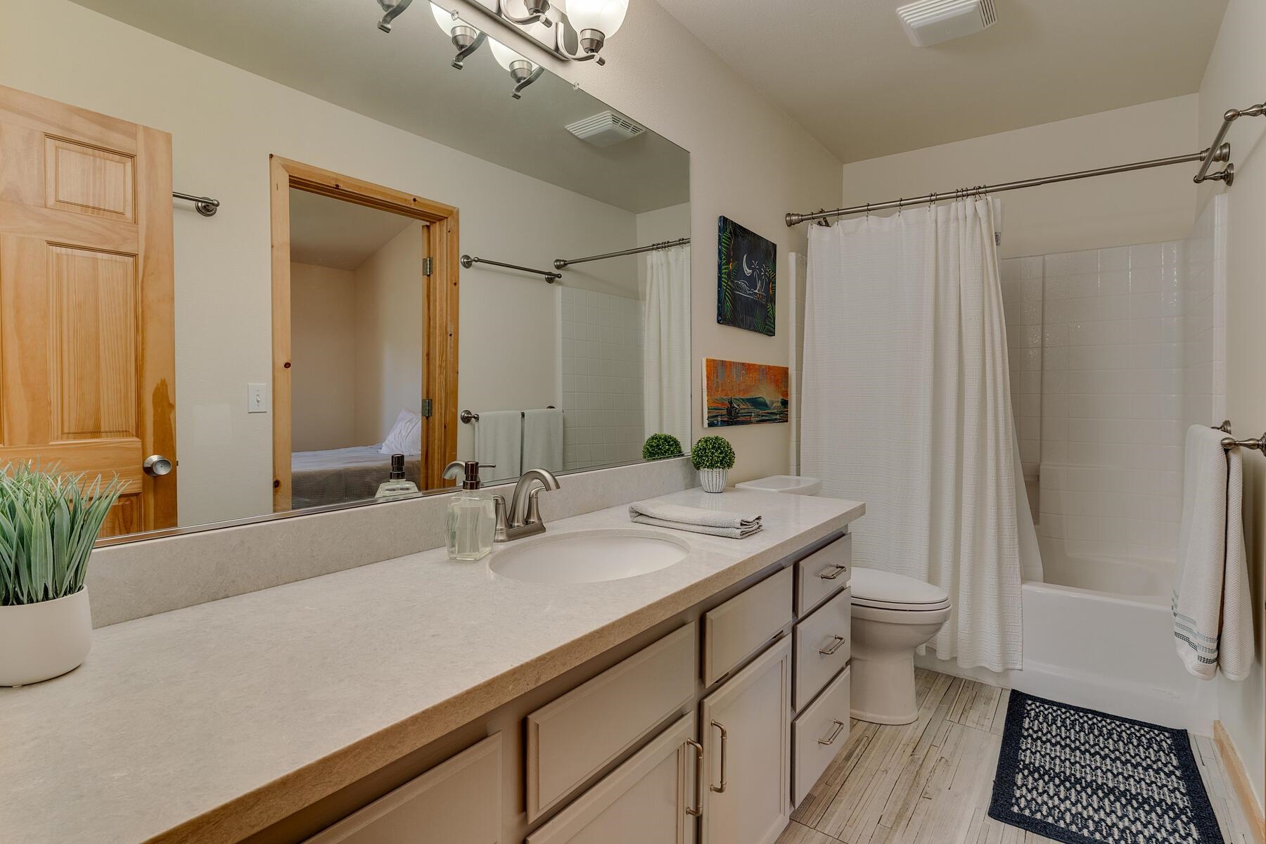 11511 Baden Road Truckee, CA 96161 - Photo 20 of 28 a bathroom with a sink and a mirror