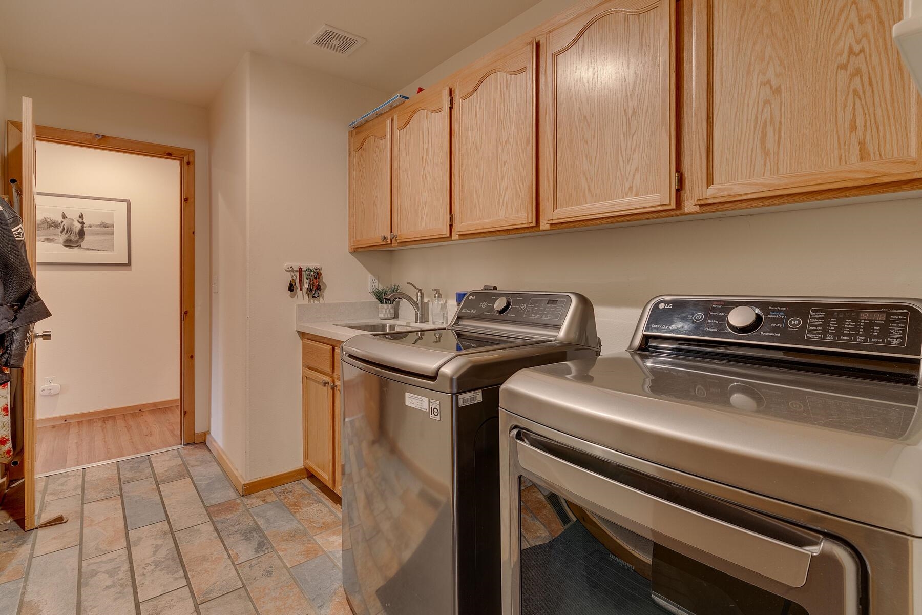 11511 Baden Road Truckee, CA 96161 - Photo 24 of 28 a utility room with dryer and washer