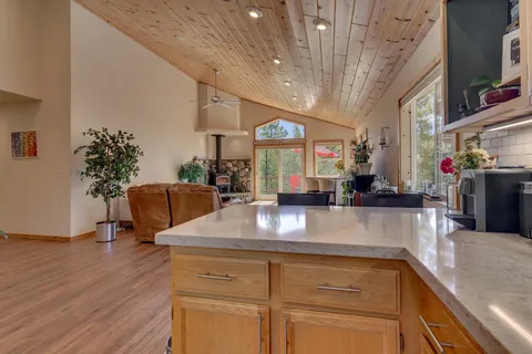a kitchen with a sink and a refrigerator