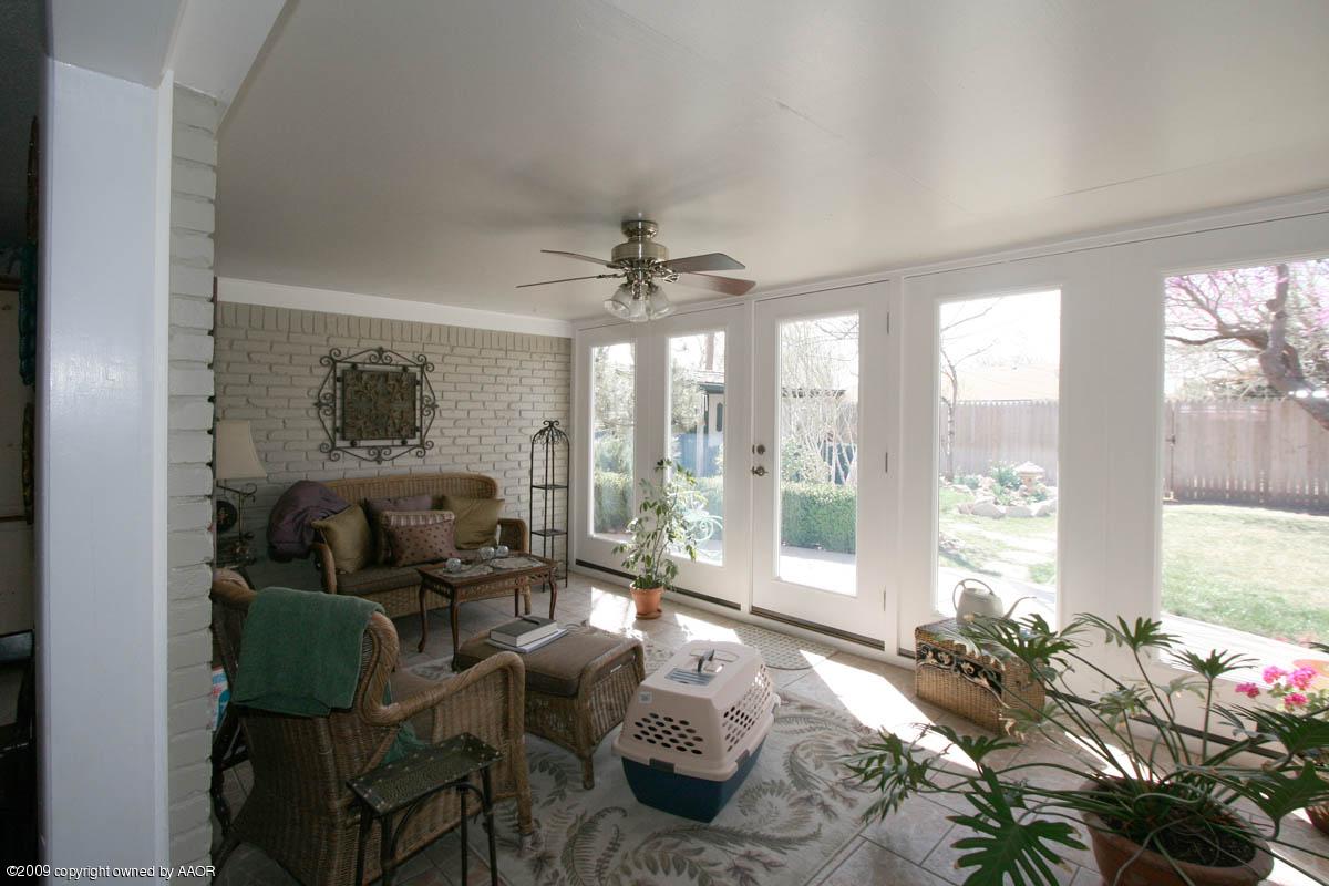 6015 Elmhurst Road Amarillo, TX 79106 - Photo 14 of 15 a living room with furniture and a large window