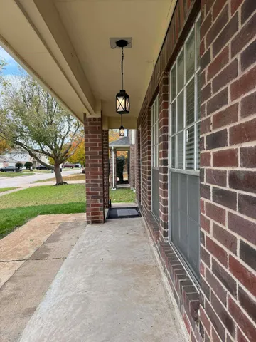 a view of a house with a porch