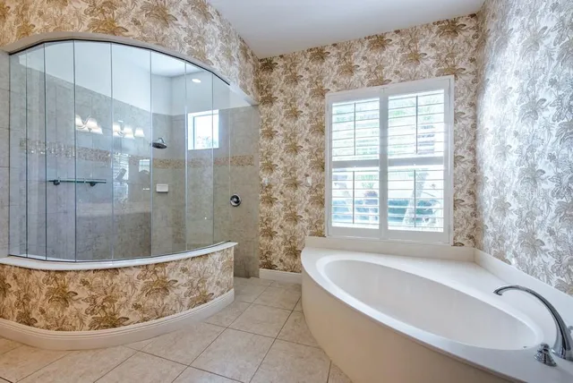 a view of room with walk in closet and window