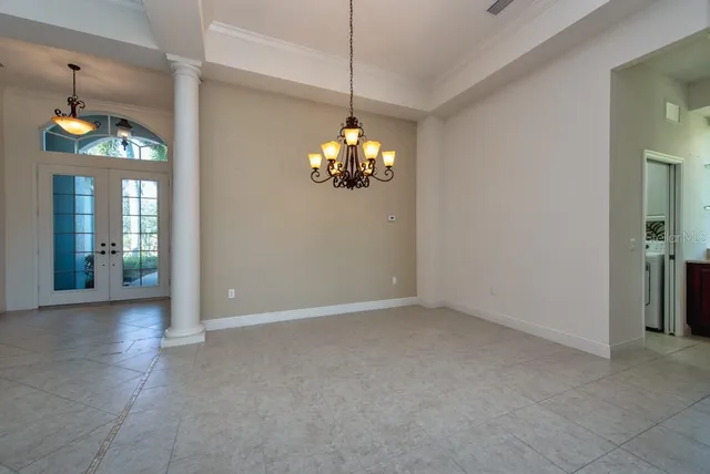 a room that has a chandelier and a chandelier