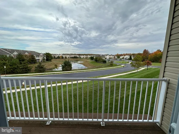 a view of a balcony with an ocean view