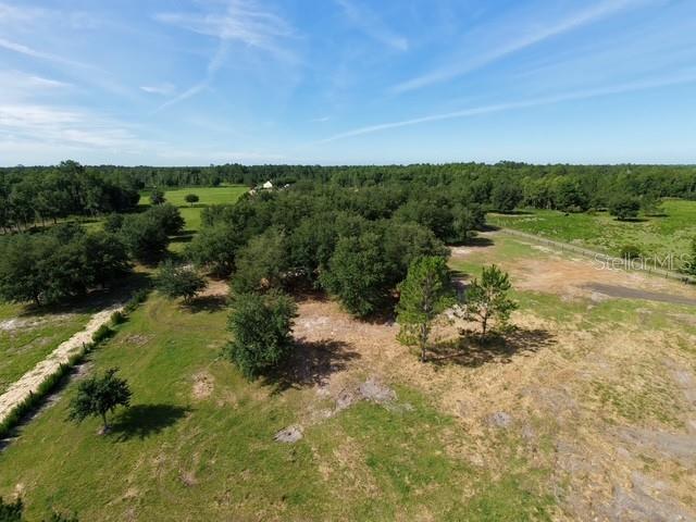 7214 Oil Well Road Clermont, FL 34714 - Photo 14 of 16 a view of a lake with a city
