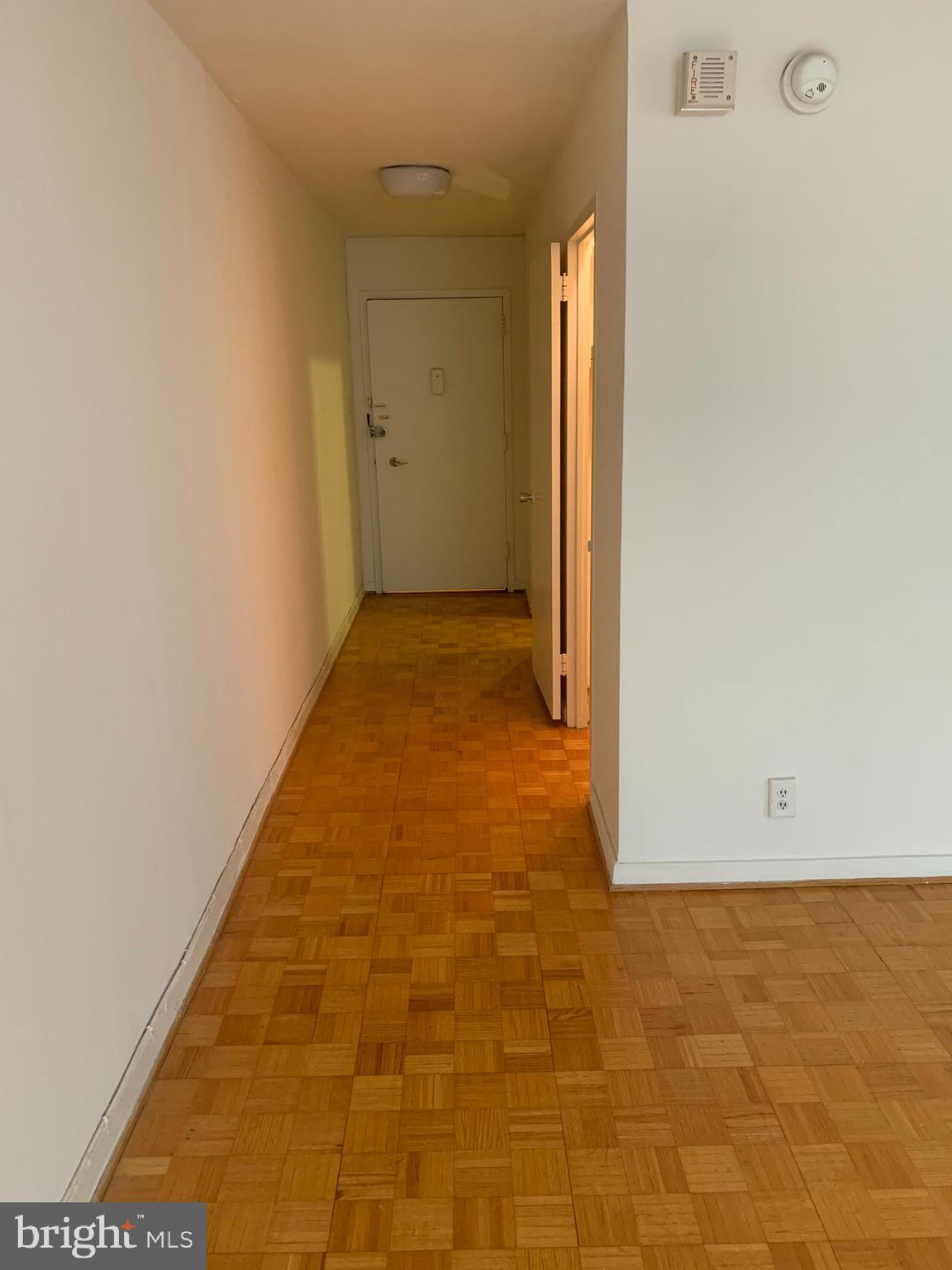224-30 West Rittenhouse Square, Unit 2004 Philadelphia, PA 19103 - Photo 10 of 18 a view of a room with a hallway