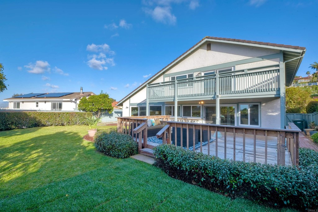 735 Santa Paula Solana Beach, CA 92075 - Photo 15 of 61 a front view of a house with a yard