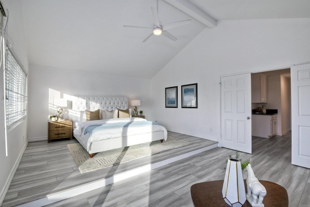 735 Santa Paula Solana Beach, CA 92075 - Photo 23 of 61 a spacious bedroom with a bed and a couch