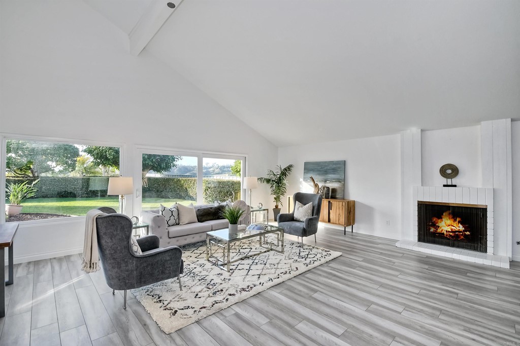 735 Santa Paula Solana Beach, CA 92075 - Photo 41 of 61 a living room with furniture fireplace and window