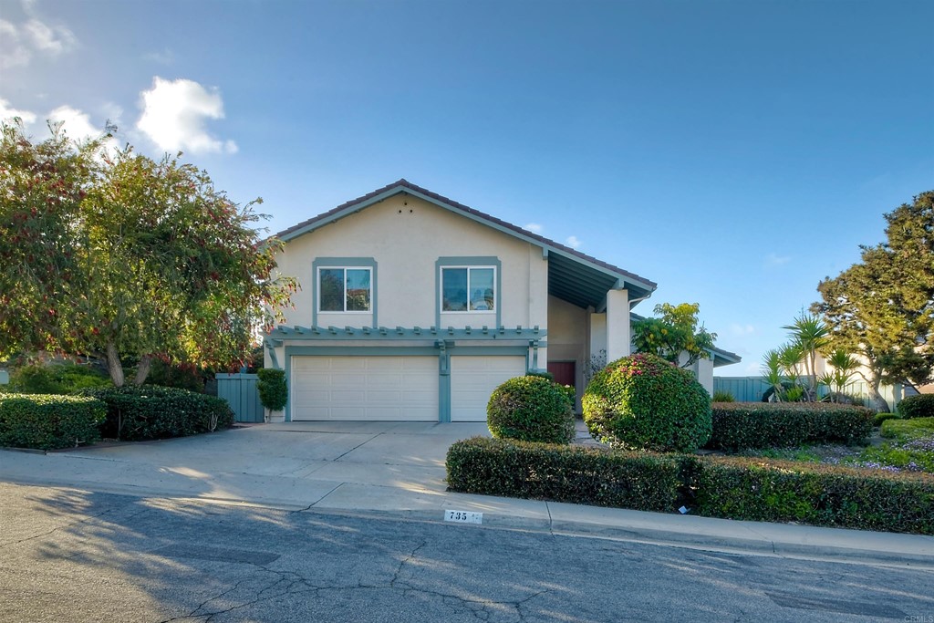 735 Santa Paula Solana Beach, CA 92075 - Photo 45 of 61 a front view of a house with a yard