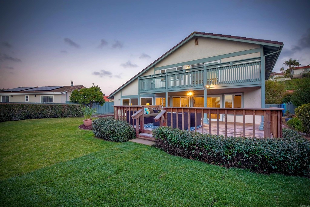 735 Santa Paula Solana Beach, CA 92075 - Photo 5 of 61 a front view of a house with a yard and outdoor seating