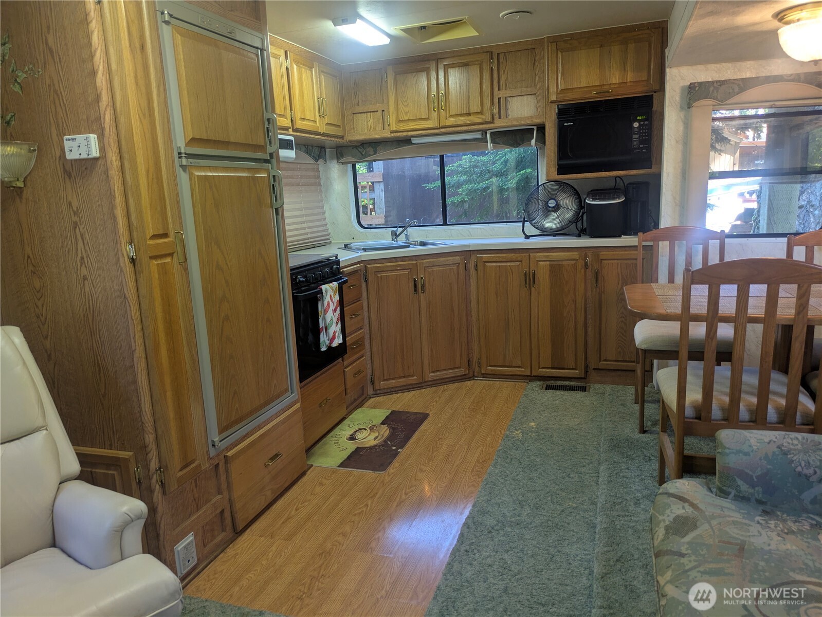 44957 Kachess Trail, Unit 2C97 Concrete, WA 98237 - Photo 5 of 16 a kitchen with refrigerator and window