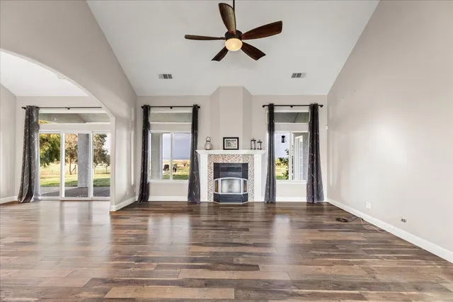 a kitchen with stainless steel appliances granite countertop a sink and a stove