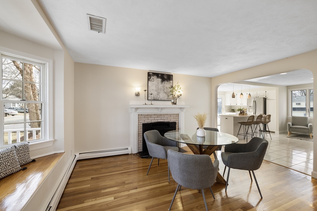 61 School Street Lexington, MA 02421 - Photo 15 of 42 a dining room with furniture window and wooden floor
