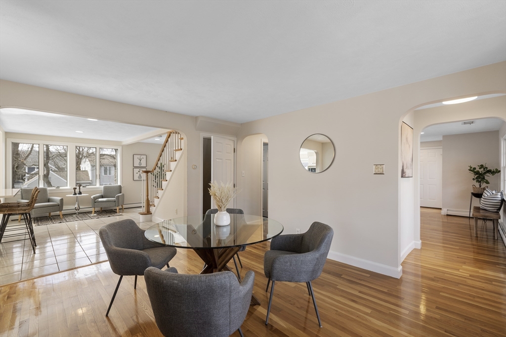 61 School Street Lexington, MA 02421 - Photo 16 of 42 a living room with furniture and wooden floor
