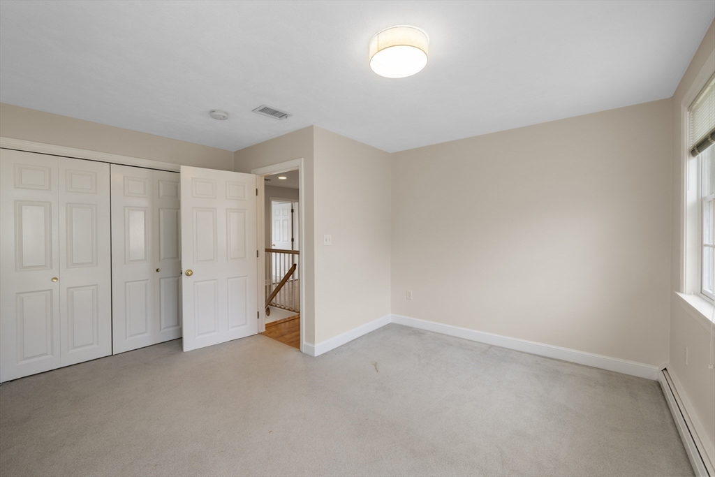 61 School Street Lexington, MA 02421 - Photo 25 of 42 a view of an empty room