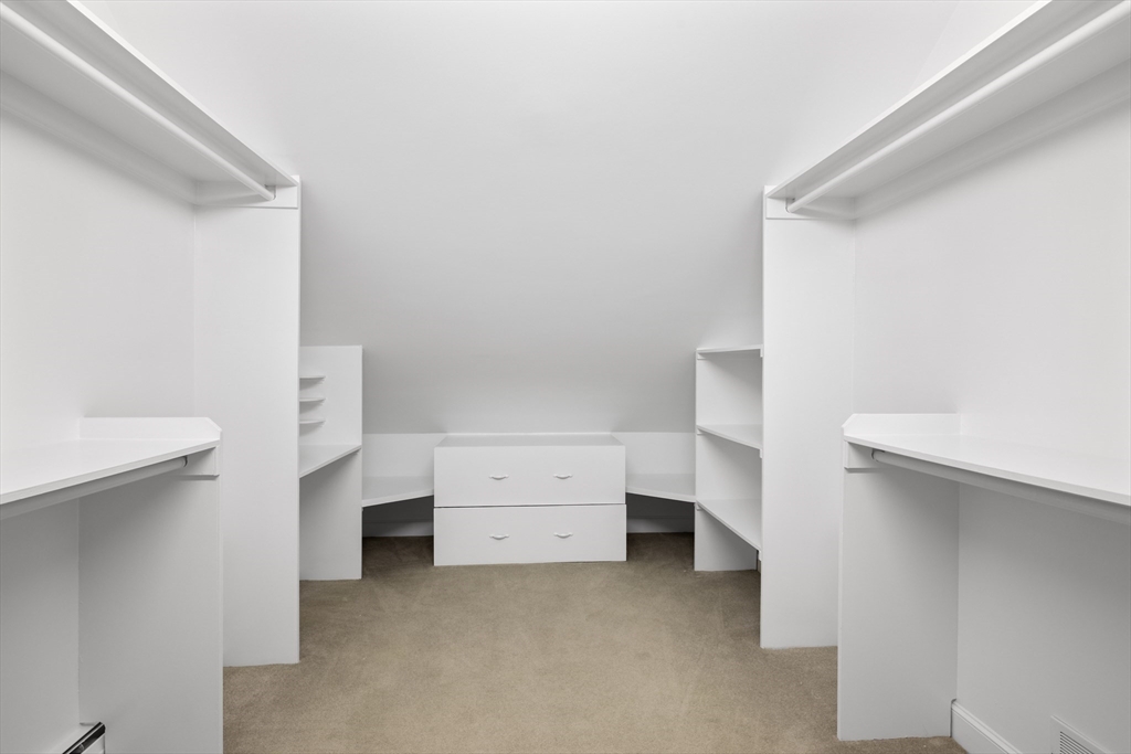 61 School Street Lexington, MA 02421 - Photo 31 of 42 a view of an empty walk in closet