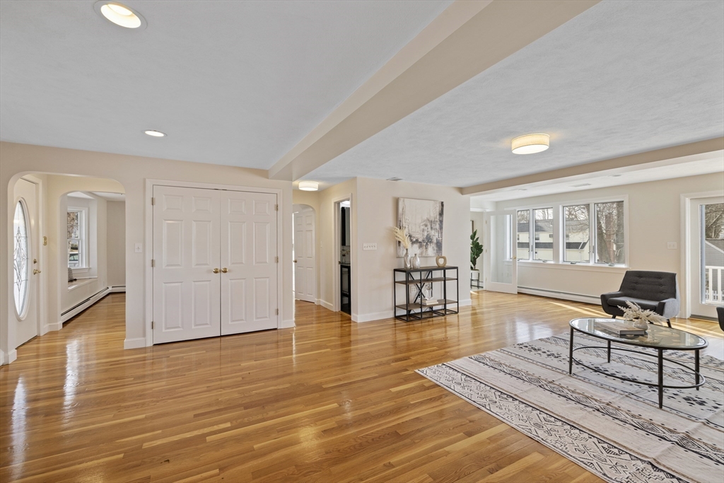 61 School Street Lexington, MA 02421 - Photo 4 of 42 a living room with furniture and large window