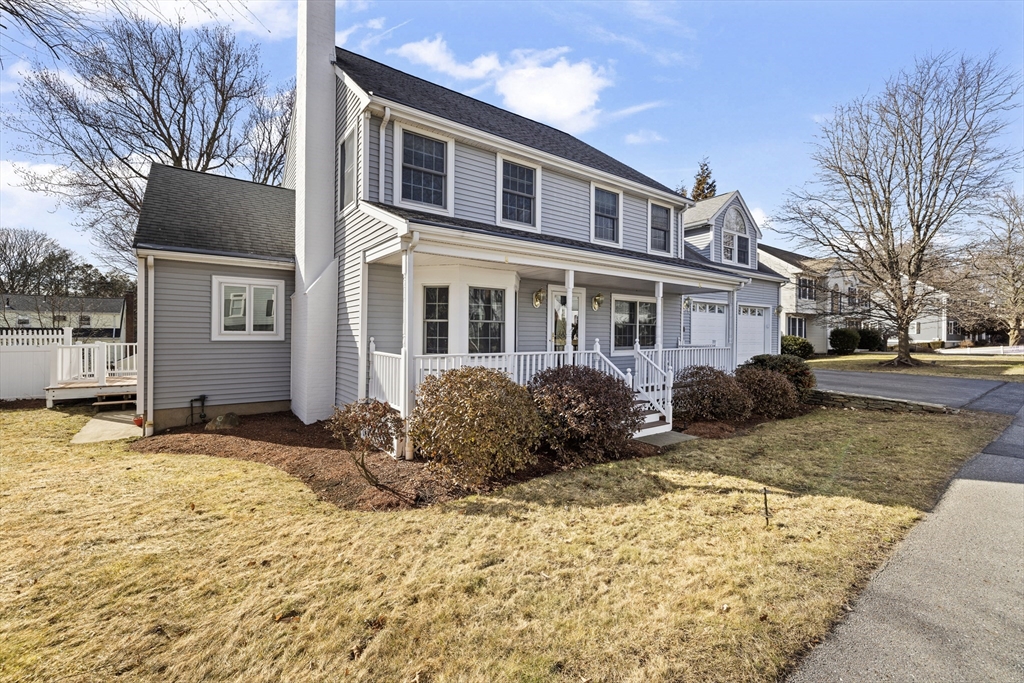 61 School Street Lexington, MA 02421 - Photo 42 of 42 a front view of a house with a yard