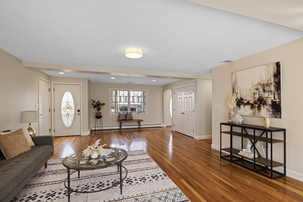 61 School Street Lexington, MA 02421 - Photo 5 of 42 a living room with furniture and wooden floor