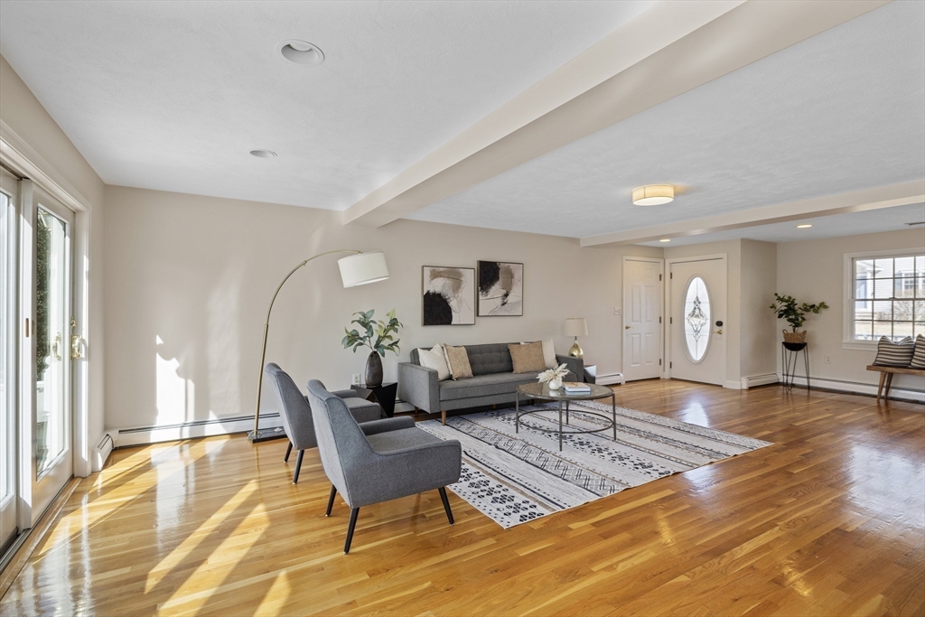 61 School Street Lexington, MA 02421 - Photo 6 of 42 a living room with furniture and a table