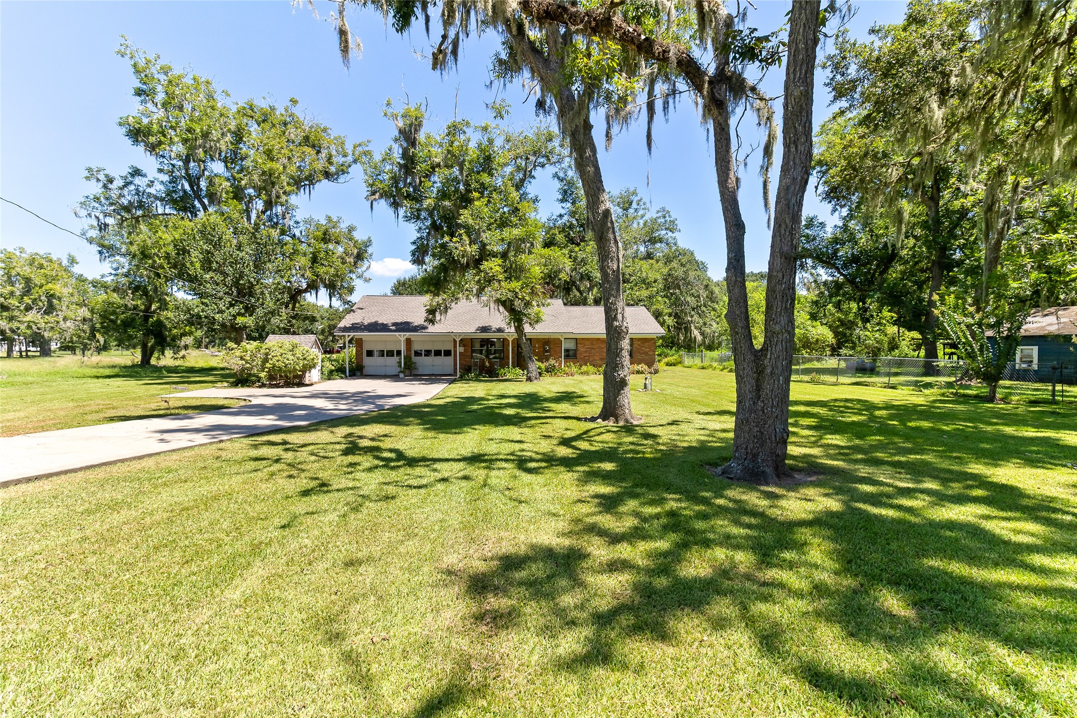 1971 FM 522 Road Brazoria, TX 77422 - Photo 2 of 26 Major updates include - Roof on the House, Hobby Shed and Workshop (2025), HVAC (2022), Water Heater (2019), Water Well (2006), Aerobic Septic System maintained by Coastal Aerobic Service