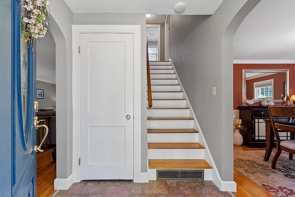 43 Sylvan Road Lancaster, MA 01523 - Photo 11 of 26 a view of a hallway with wooden floor and entryway