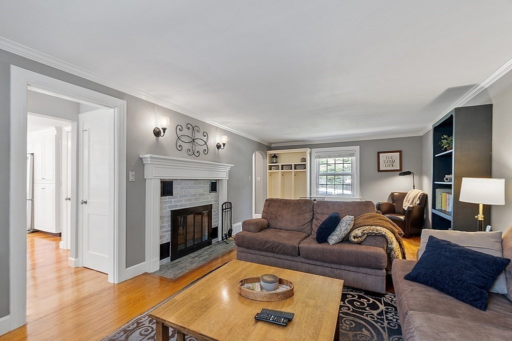 43 Sylvan Road Lancaster, MA 01523 - Photo 13 of 26 a living room with furniture and a fireplace