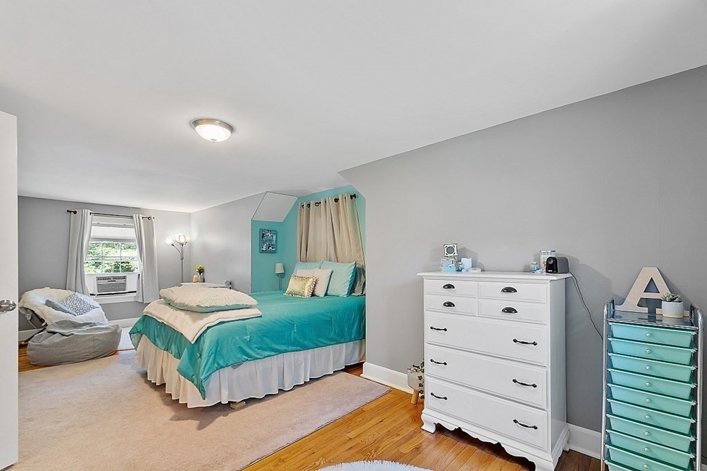 43 Sylvan Road Lancaster, MA 01523 - Photo 16 of 26 a bedroom with a bed and window