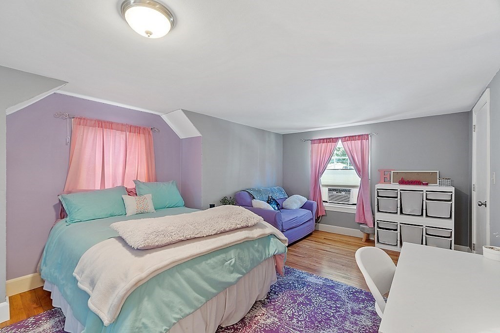 43 Sylvan Road Lancaster, MA 01523 - Photo 18 of 26 a bedroom with a bed and dresser