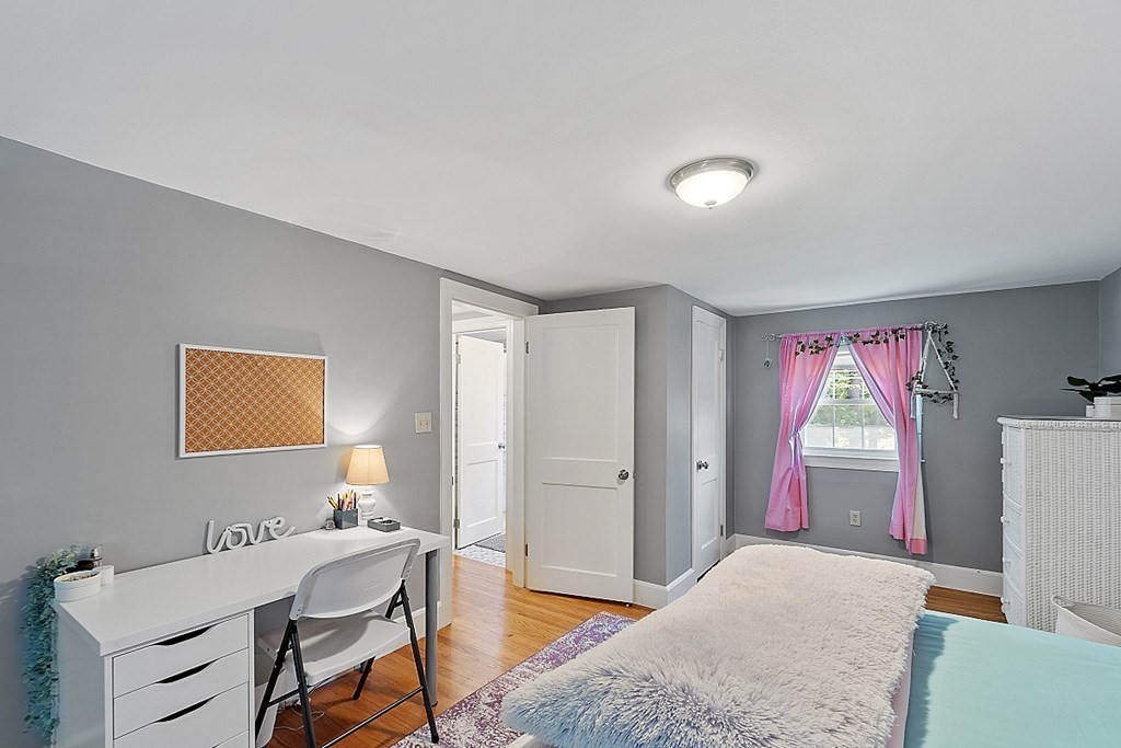 43 Sylvan Road Lancaster, MA 01523 - Photo 19 of 26 a bedroom with a bed and a window