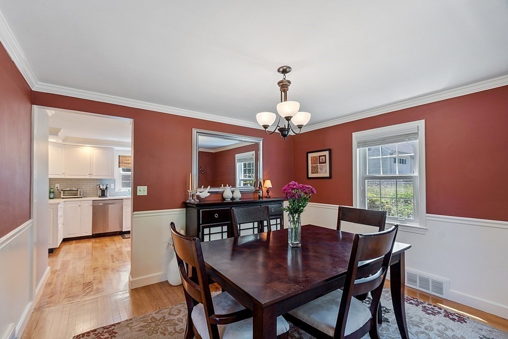 43 Sylvan Road Lancaster, MA 01523 - Photo 8 of 26 a view of a dining room with furniture window and wooden floor