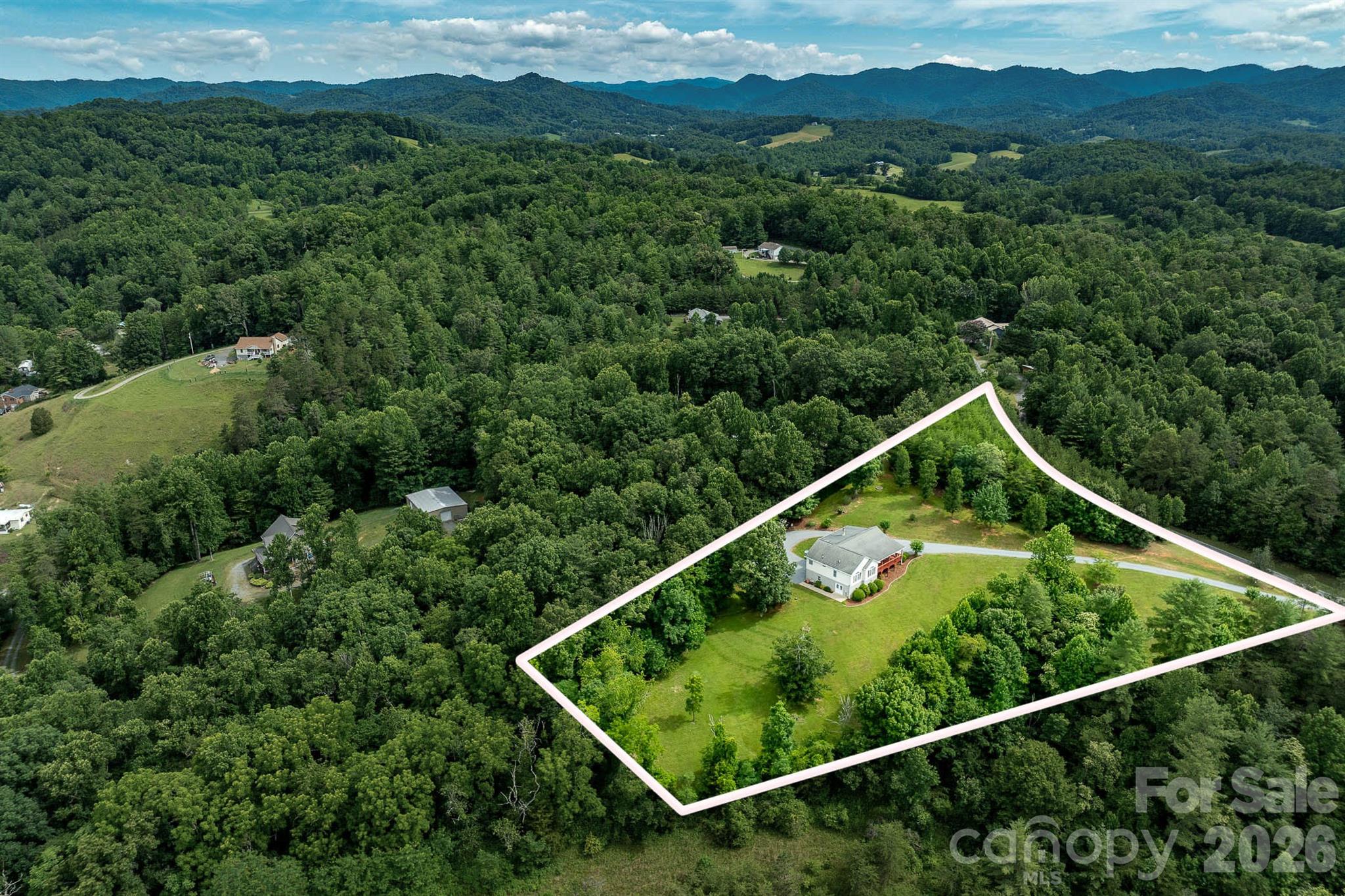 1697 Windswept Ridge Road Marshall, NC 28753 - Photo 36 of 48 a view of a tennis court