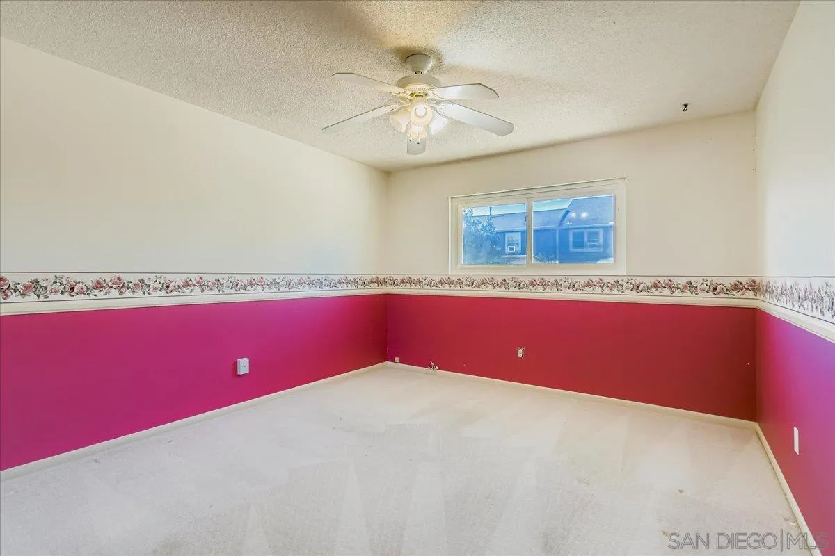 3245 Valley Street Carlsbad, CA 92008 - Photo 18 of 30 a workspace with a chandelier