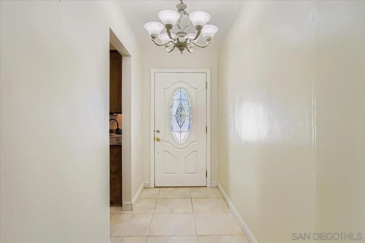 3245 Valley Street Carlsbad, CA 92008 - Photo 5 of 30 a view of entryway with chandelier