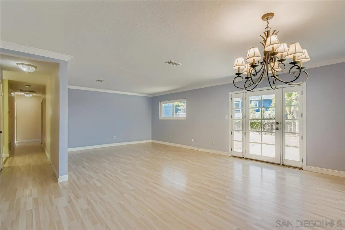 3245 Valley Street Carlsbad, CA 92008 - Photo 7 of 30 a view of an empty room with a window