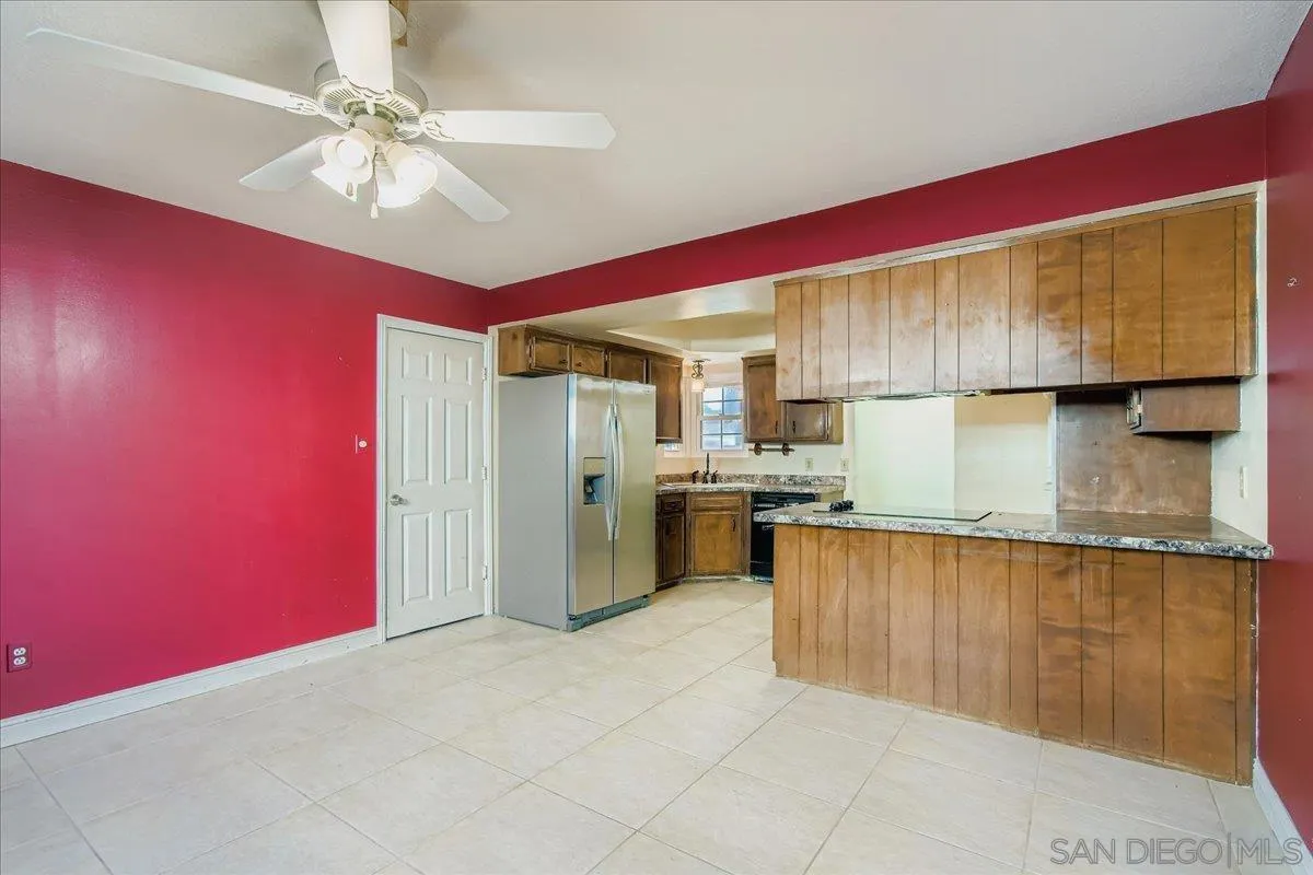 3245 Valley Street Carlsbad, CA 92008 - Photo 10 of 30 a kitchen with a refrigerator a sink and dishwasher