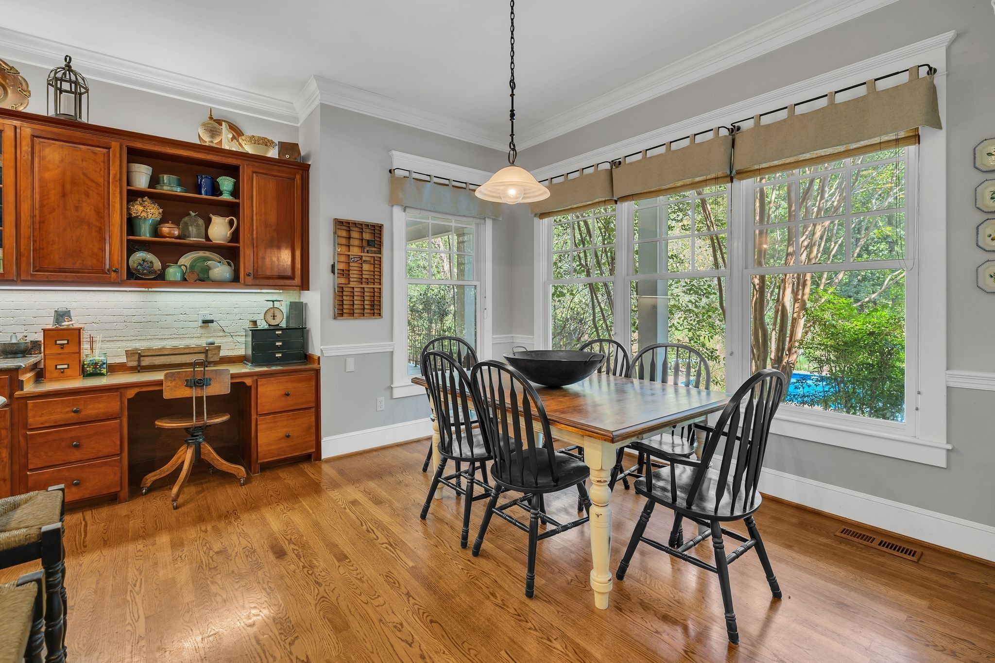 94 Oak Shadow Drive Loretto, TN 38469 - Photo 15 of 68 a view of a dining room with furniture window and wooden floor