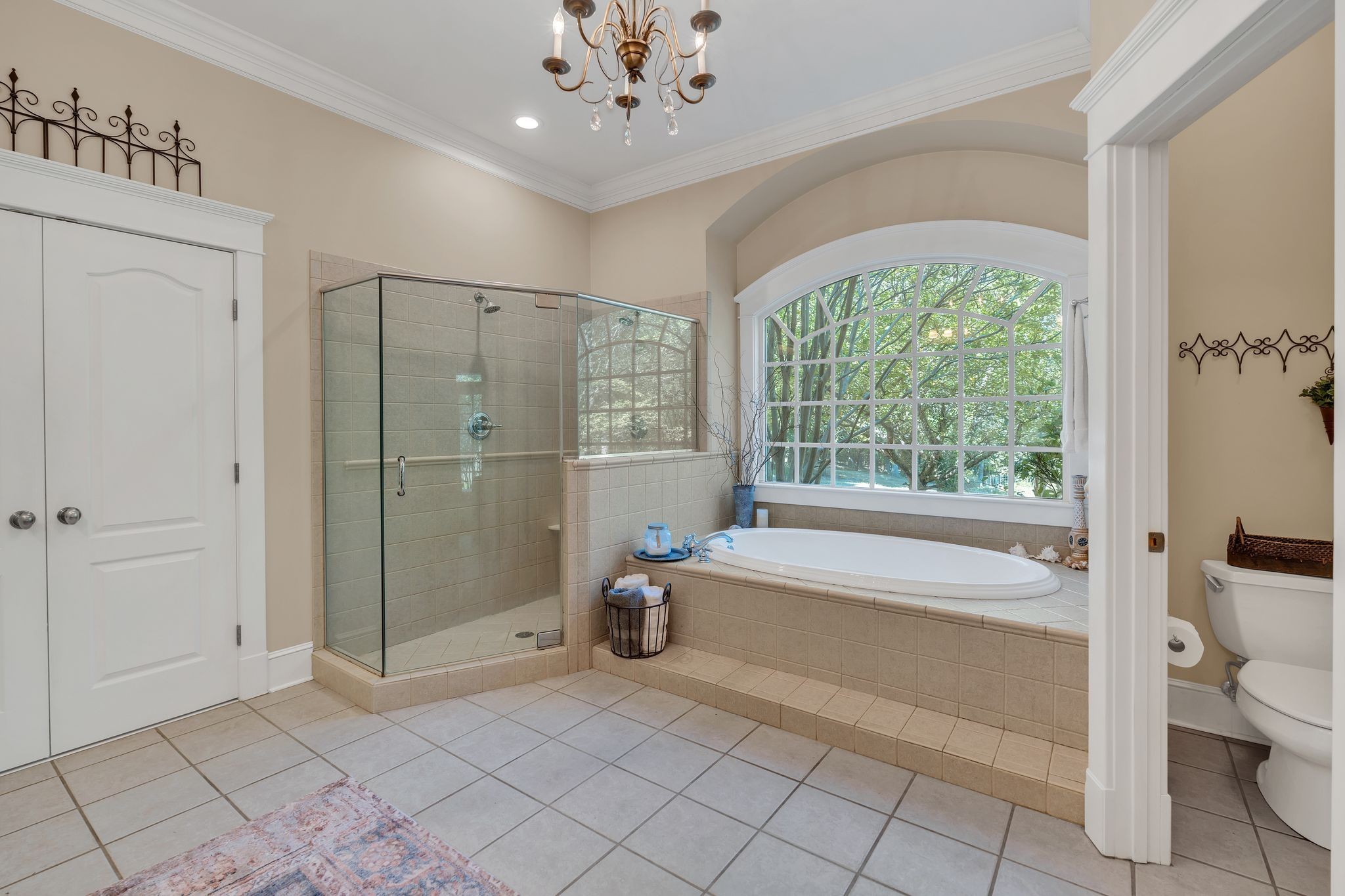 94 Oak Shadow Drive Loretto, TN 38469 - Photo 36 of 68 a spacious bathroom with a tub shower and sink