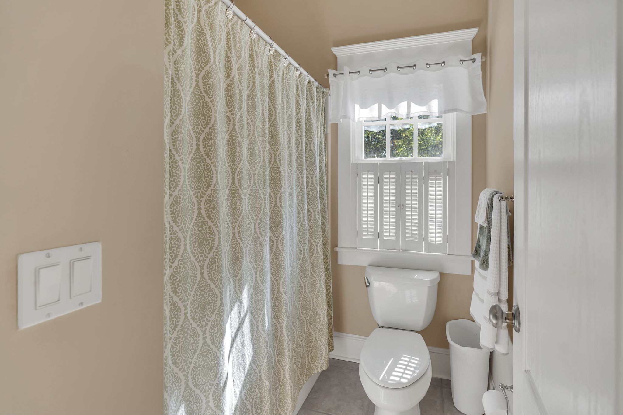 94 Oak Shadow Drive Loretto, TN 38469 - Photo 41 of 68 a white toilet sitting next to a bathroom sink