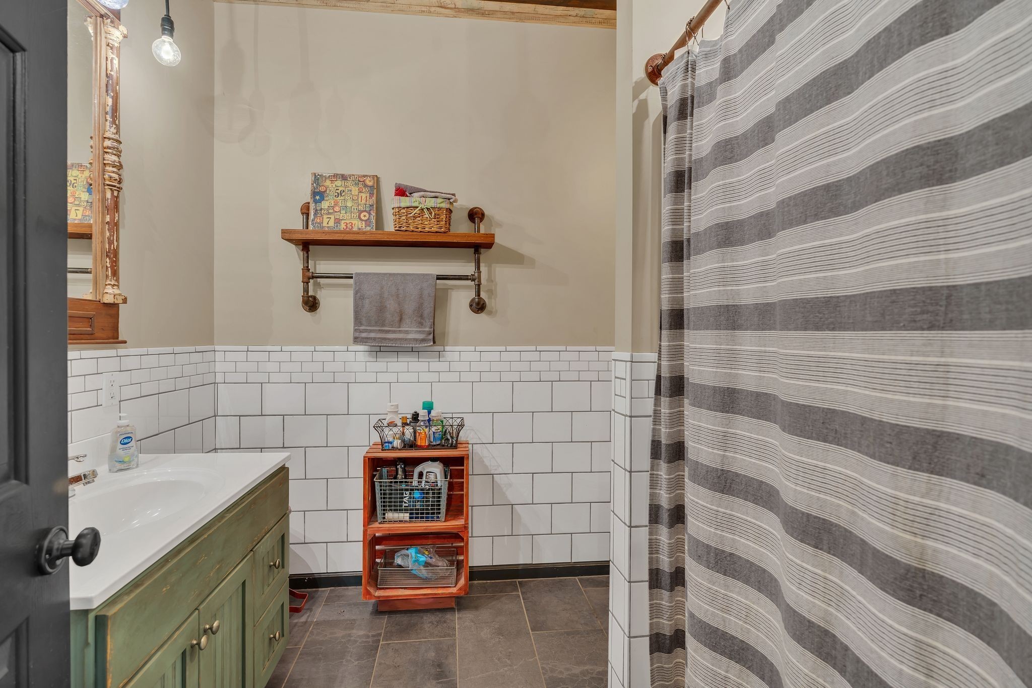 94 Oak Shadow Drive Loretto, TN 38469 - Photo 53 of 68 a bathroom with a sink and a mirror