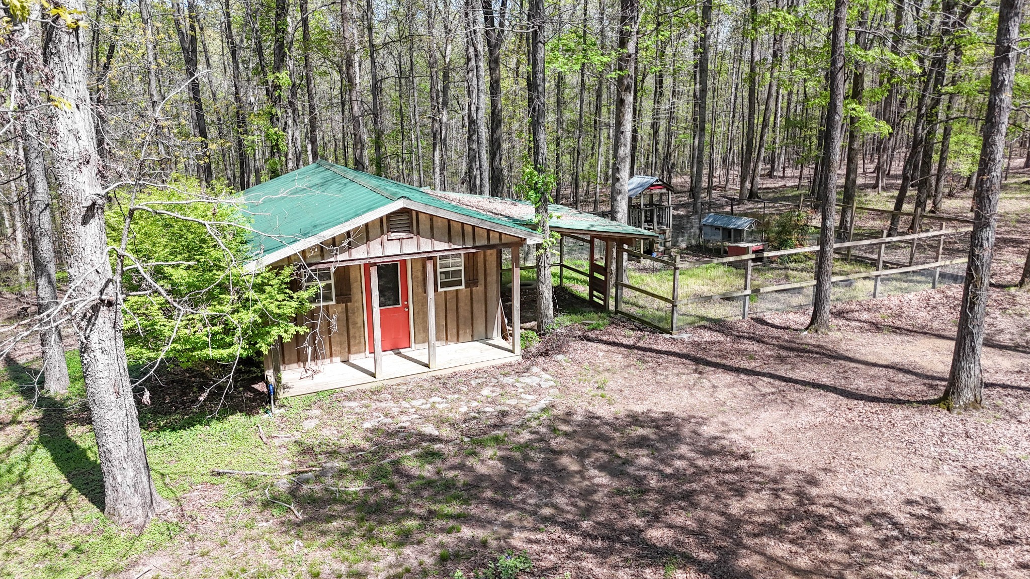 94 Oak Shadow Drive Loretto, TN 38469 - Photo 6 of 68 a front view of a house with a garden