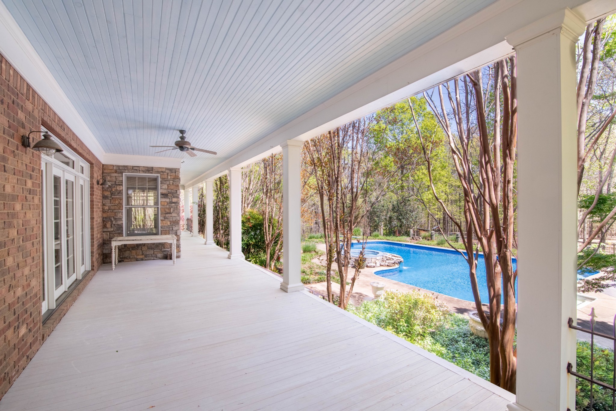 94 Oak Shadow Drive Loretto, TN 38469 - Photo 64 of 68 a view of a porch with furniture and garden