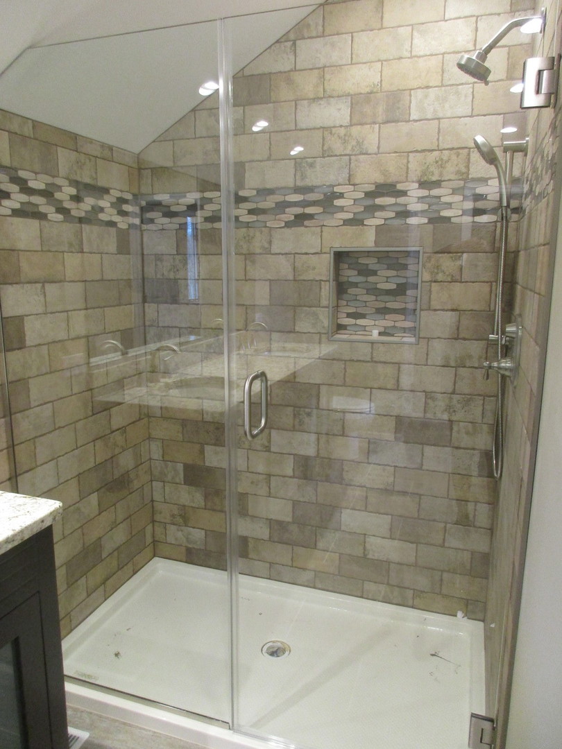 507 San Carlos Road Minooka, IL 60447 - Photo 19 of 48 a bathroom with a shower