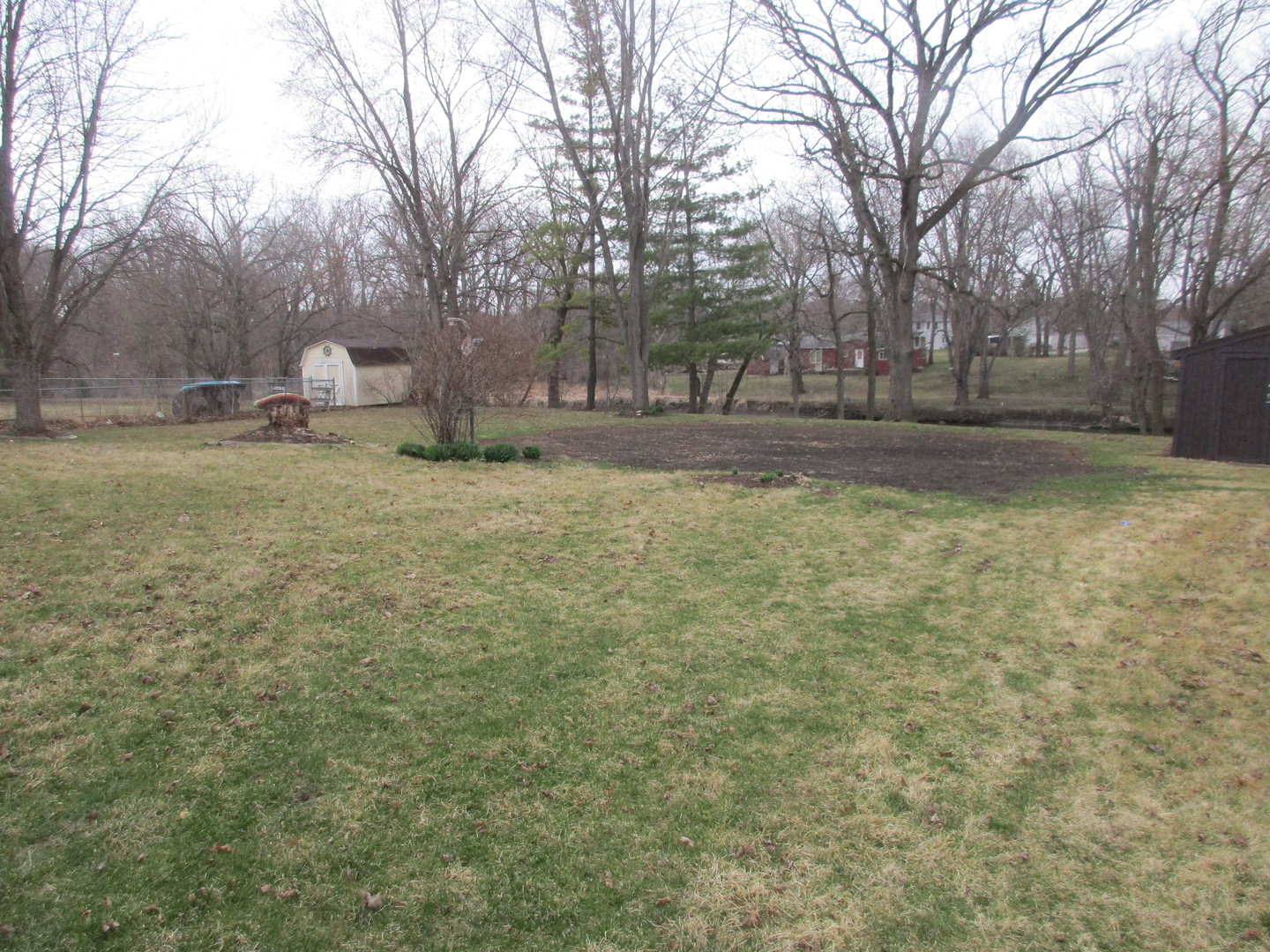 507 San Carlos Road Minooka, IL 60447 - Photo 44 of 48 a view of outdoor space with trees